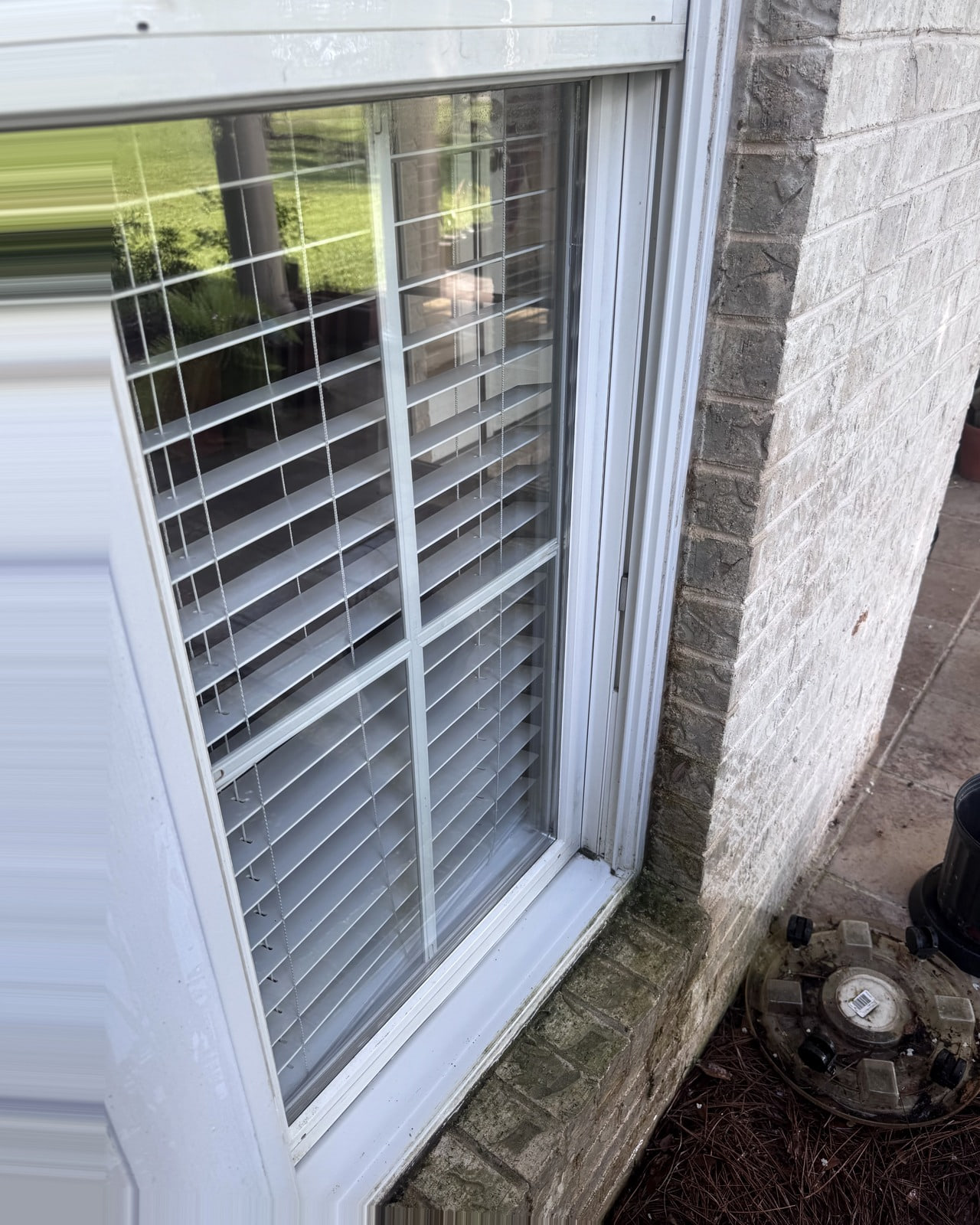 The same brick-home window after cleaning.