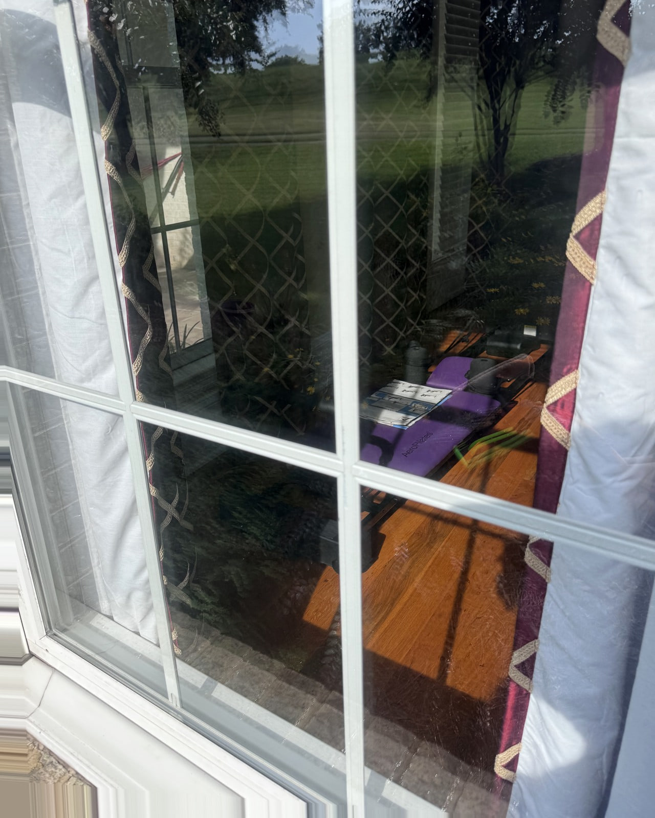 The same residential window after exterior cleaning.